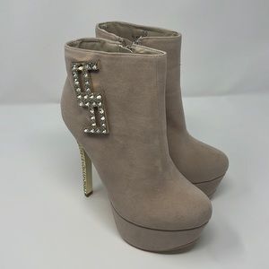 $ sign platform heels